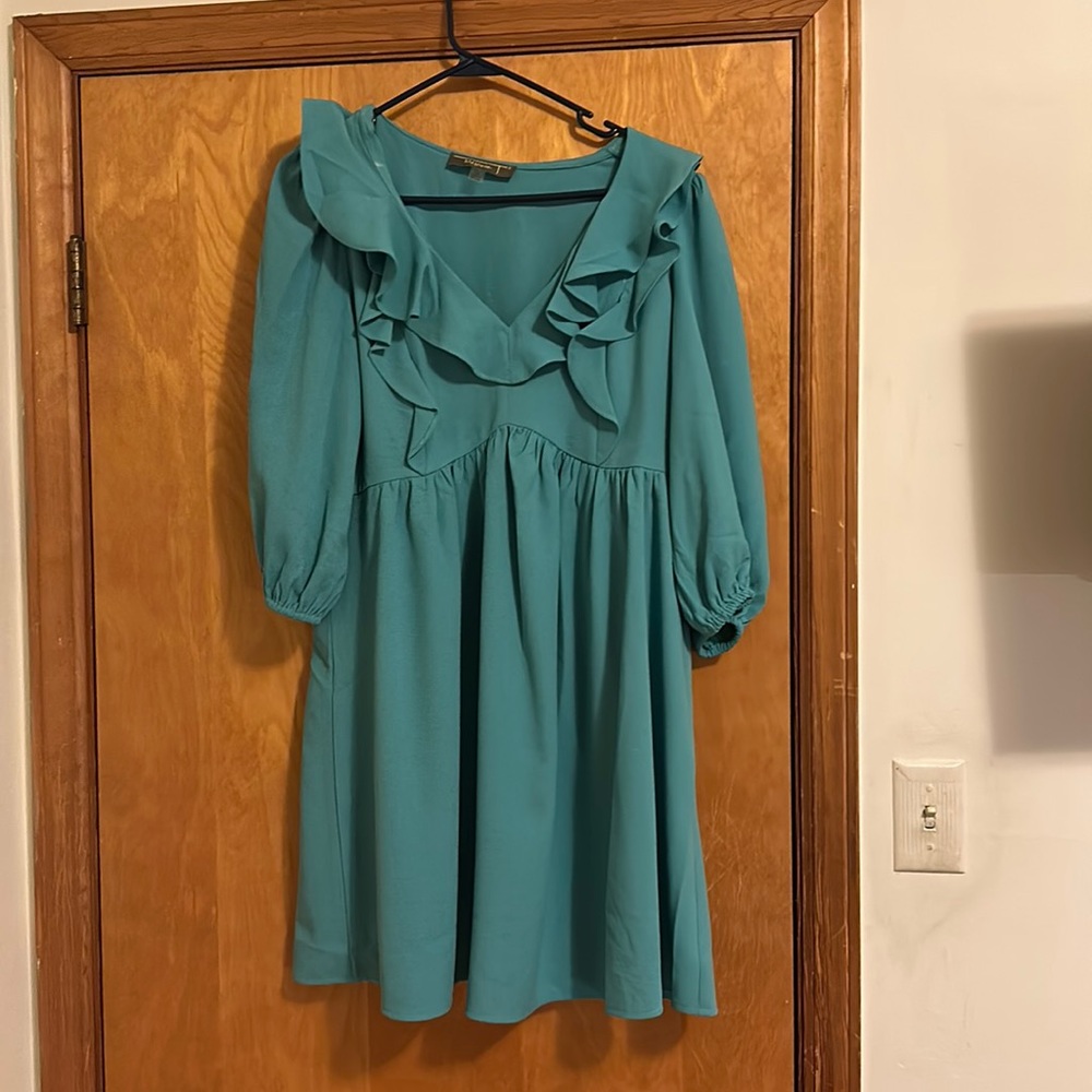 Cute sea foam, baby doll dress, three-quarter length sleeves, size 12
